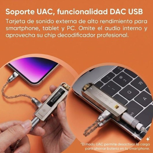 Przenośna karta dźwiękowa USB DAC podłączona do smartfona i klawiatury laptopa na pomarańczowym tle.