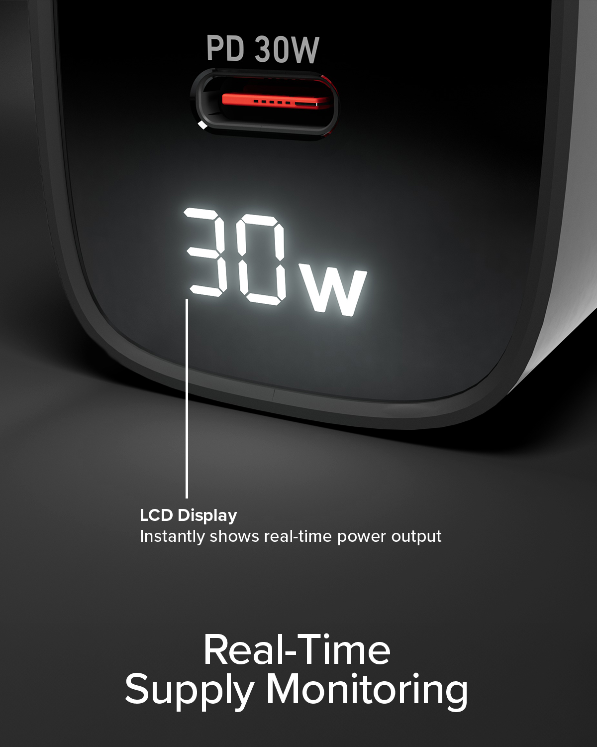 Un cargador USB-C negro con una pantalla LCD que muestra la potencia de salida de 30W en tiempo real.