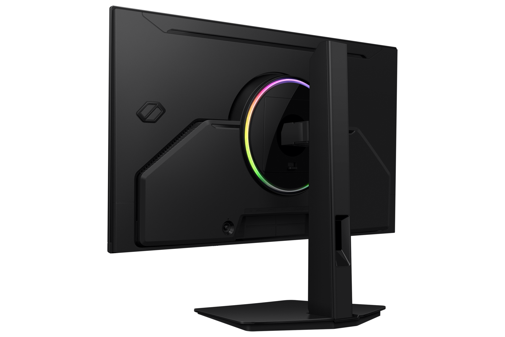 Vista trasera de un monitor negro con luz RGB circular y soporte resistente sobre fondo negro.
