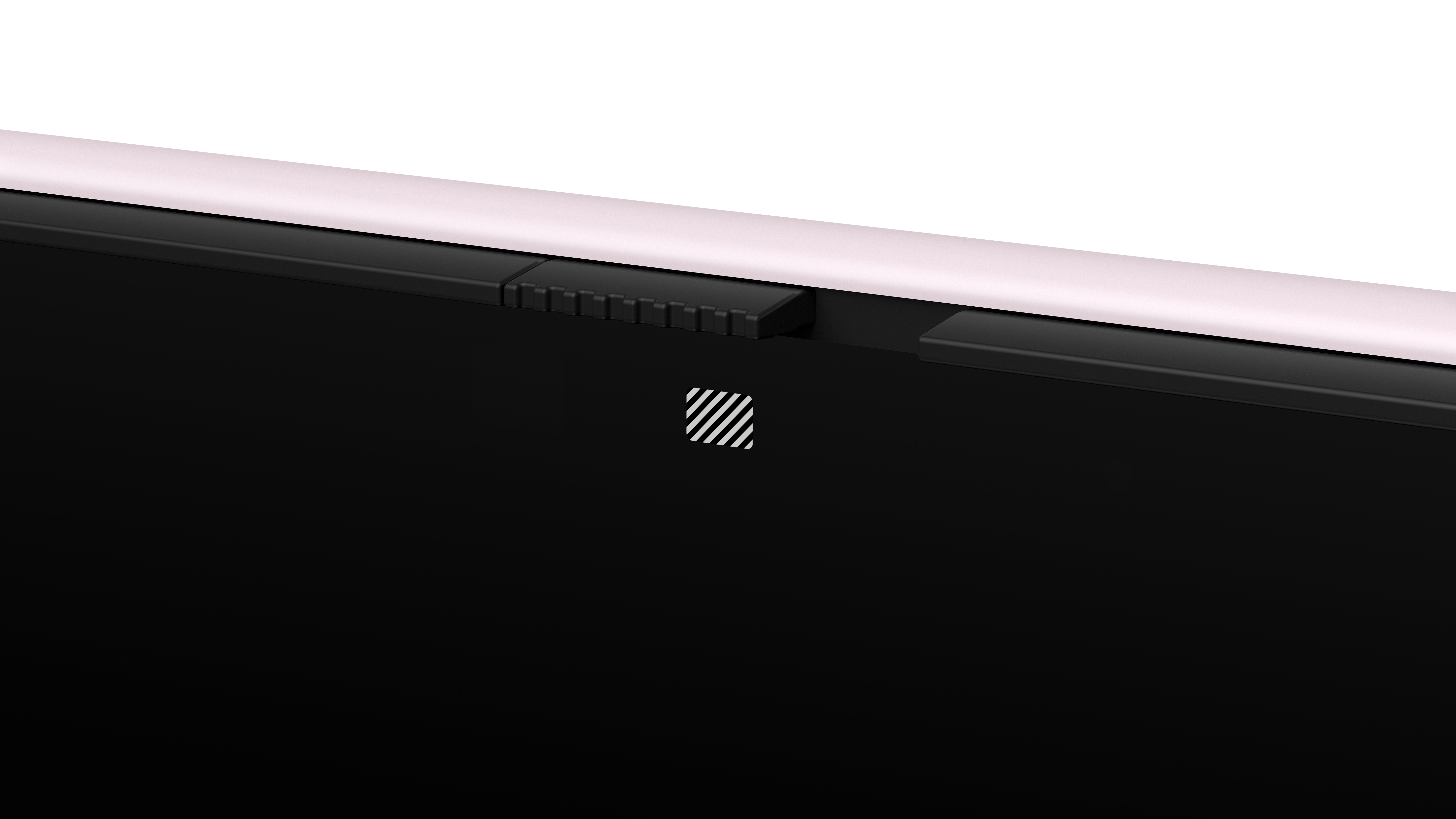Close-up of a black device with a white and black logo and a pink edge against a white background.