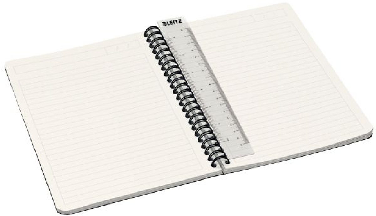 Ein offenes Spiralnotizbuch mit linierten Seiten und einem klaren Lineal als Lesezeichen.