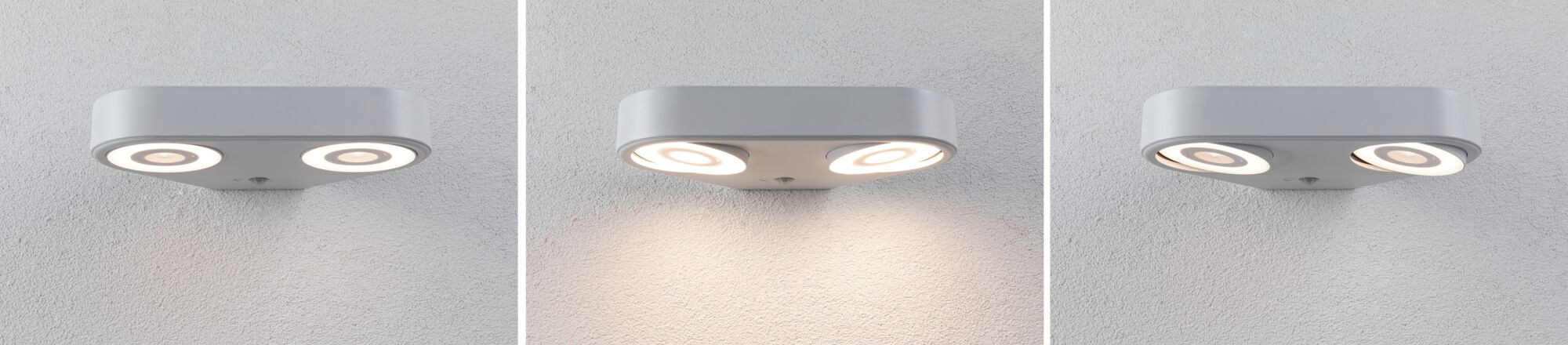 Trzy widoki nowoczesnej szarej lampy ściennej z dwoma okrągłymi oświetlonymi soczewkami na białej ścianie.