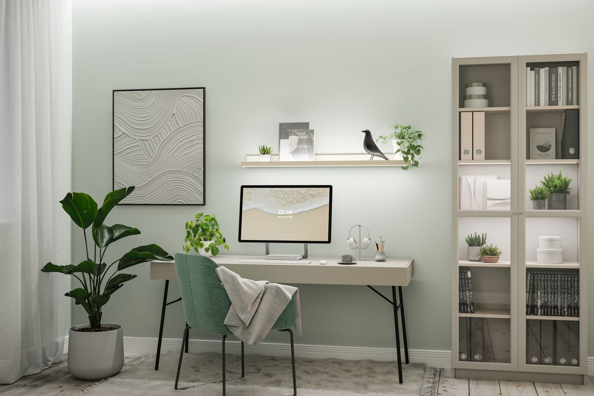 Moderne Arbeitsplatz mit einem Computer auf dem Schreibtisch, einem grünen Stuhl, Kunst an der Wand und einem großen Regal.