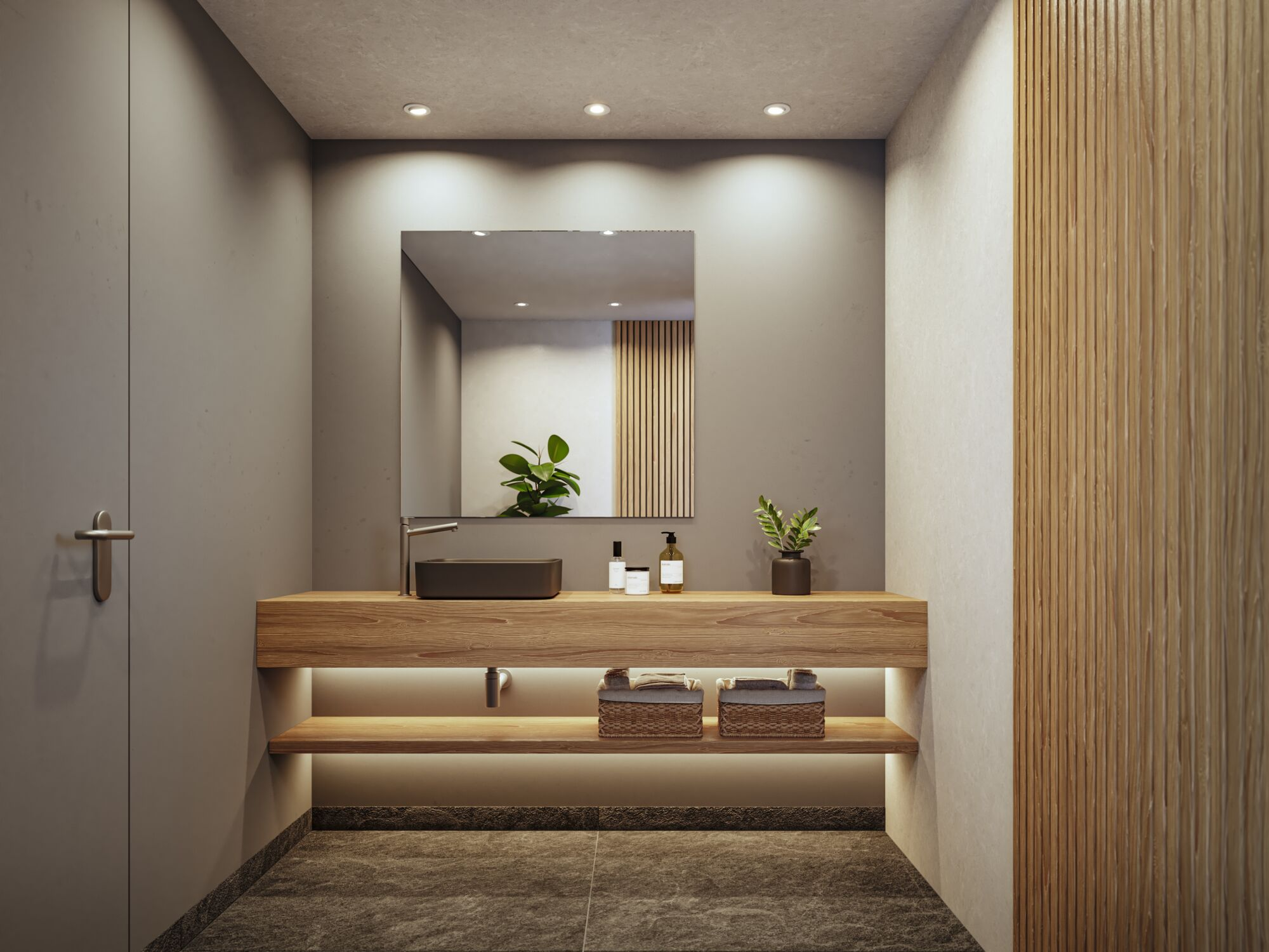Ein modernes Badezimmer mit Holztresen, dunklem Waschbecken, Spiegel und beleuchteten Regalen mit Körben.