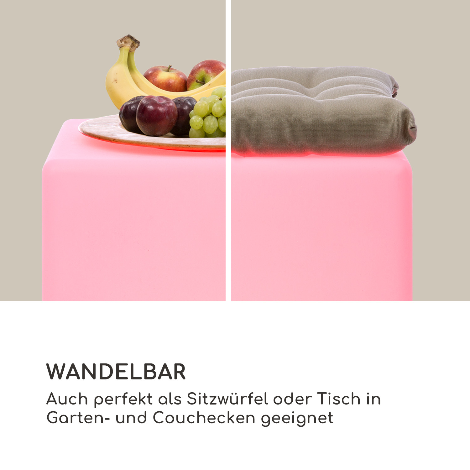 Ein rosafarbener Würfel mit frischem Obst auf der linken Seite und einem grauen Kissen auf der rechten Seite.