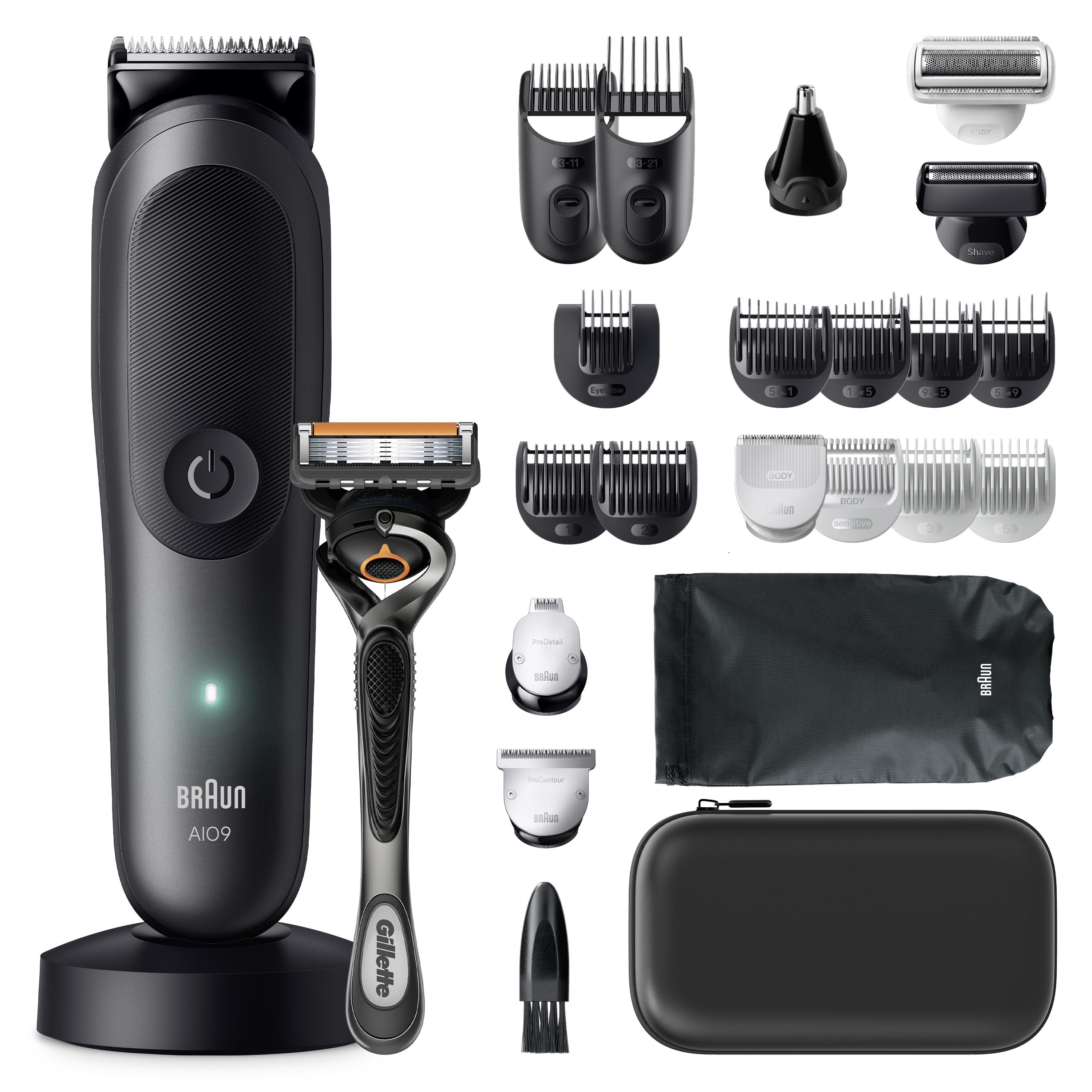 Çoklu başlık tarakları, Gillette tıraş bıçağı, fırça ve iki taşıma çantası olan siyah Braun tıraş makinesi.