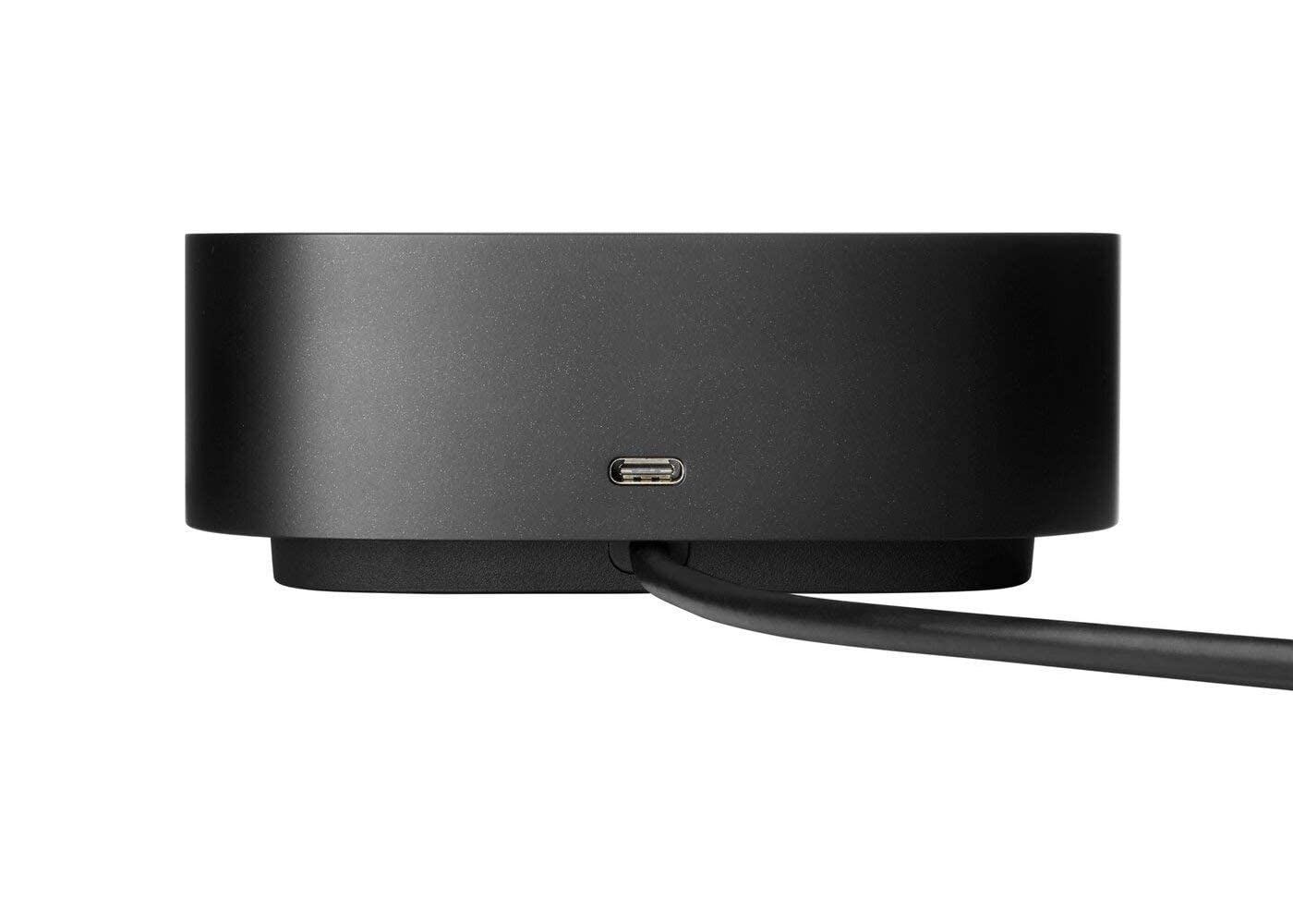 Appareil électronique noir avec port USB-C et câble branché sur fond blanc.