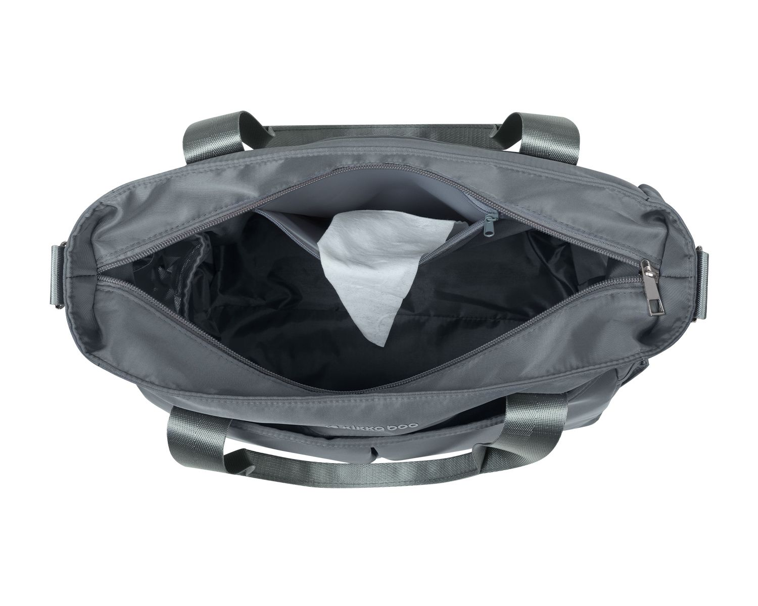 Eine offene graue Handtasche von oben fotografiert mit einem Taschentuch im inneren Reißverschlussfach.