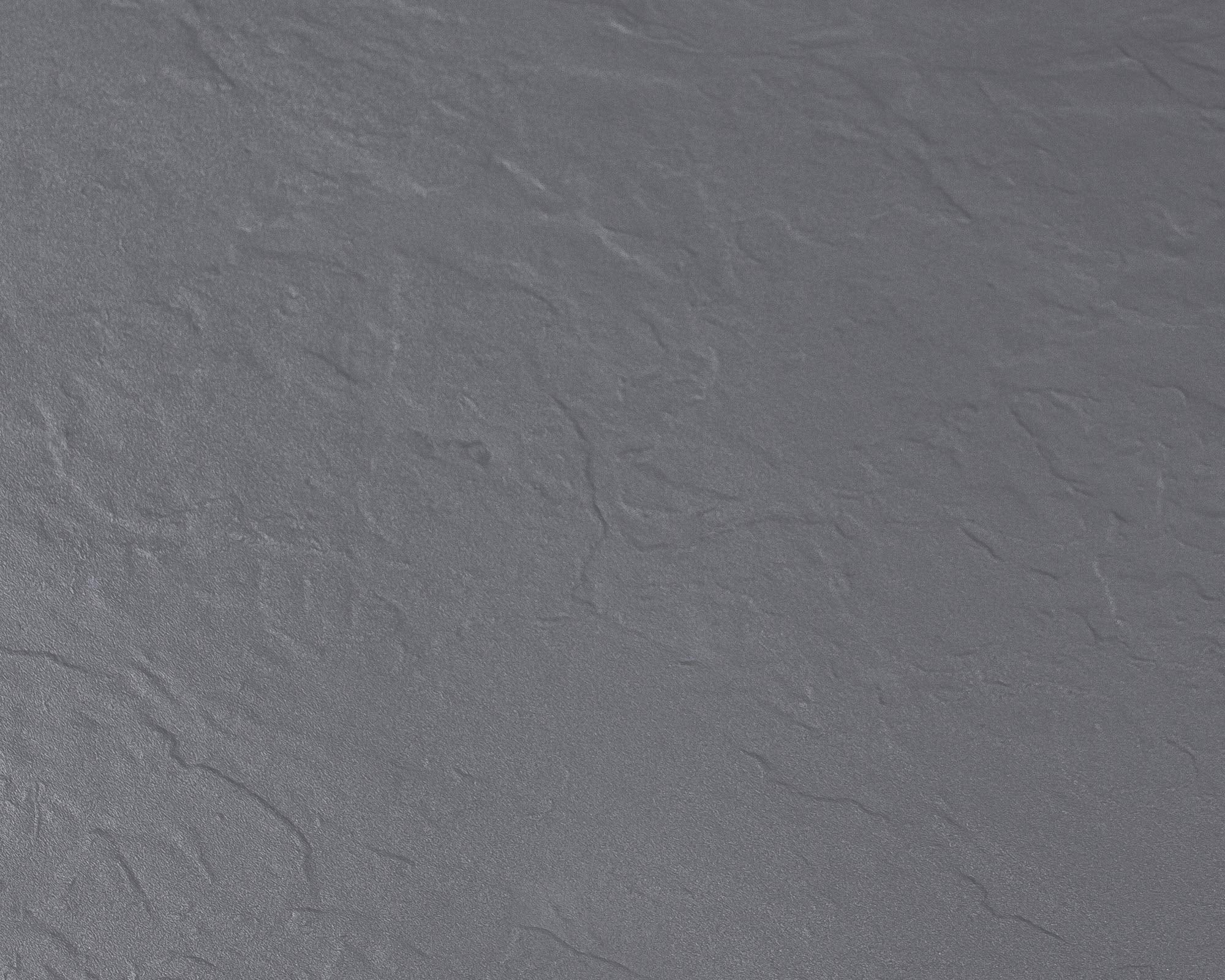 Une surface grise avec une finition rugueuse et texturée.