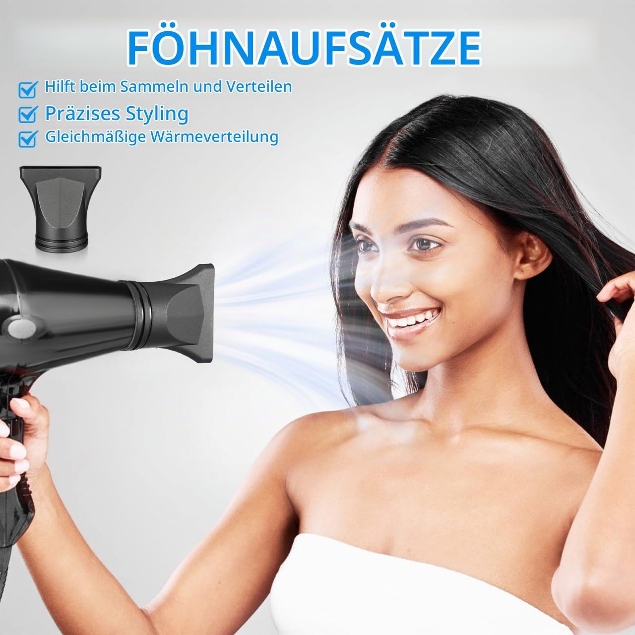 Eine Frau lächelt, während ihr glänzendes Haar mit einem schwarzen Föhn gestylt wird.