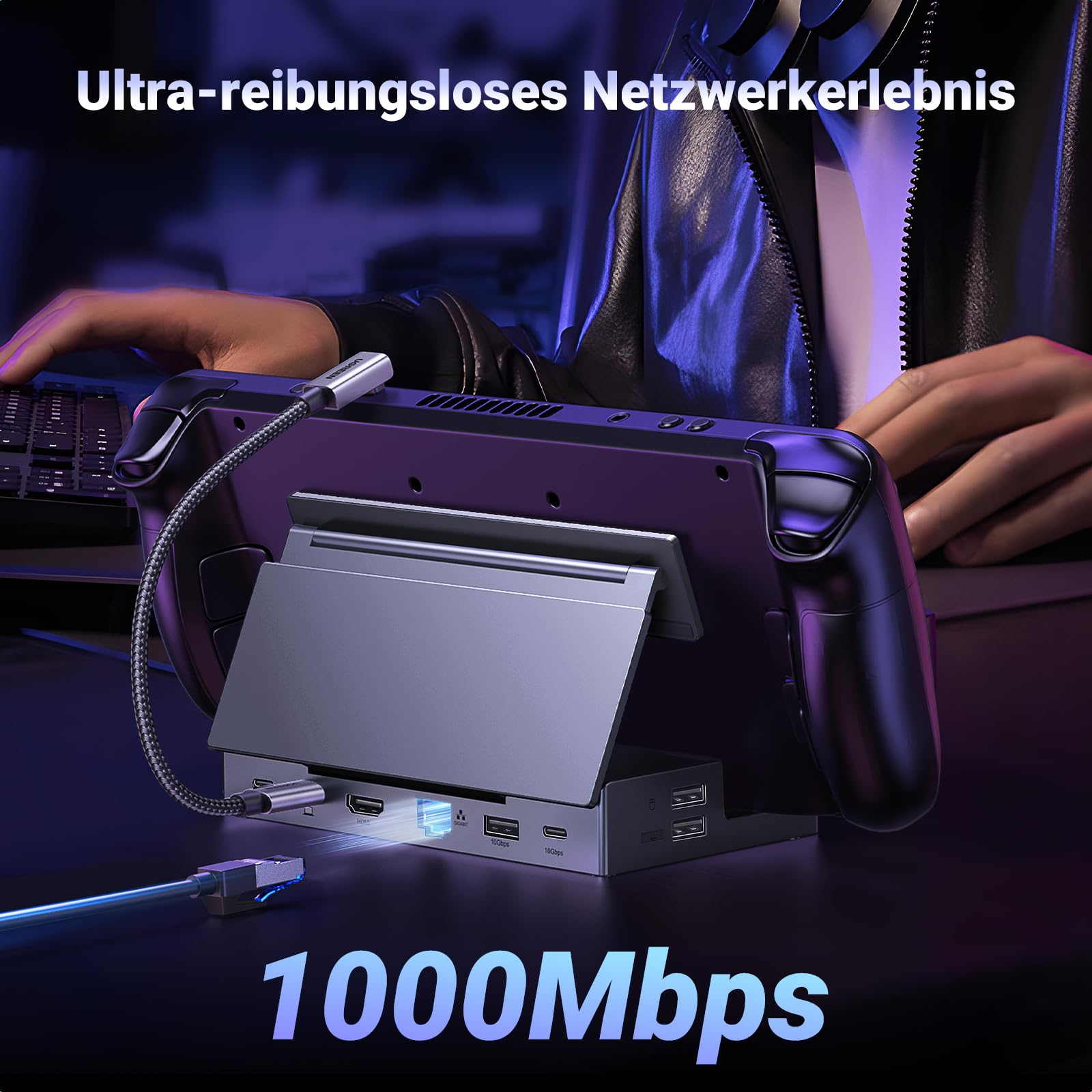 Console portable sur station d'accueil grise avec câbles connectés sur table sombre, avec texte.