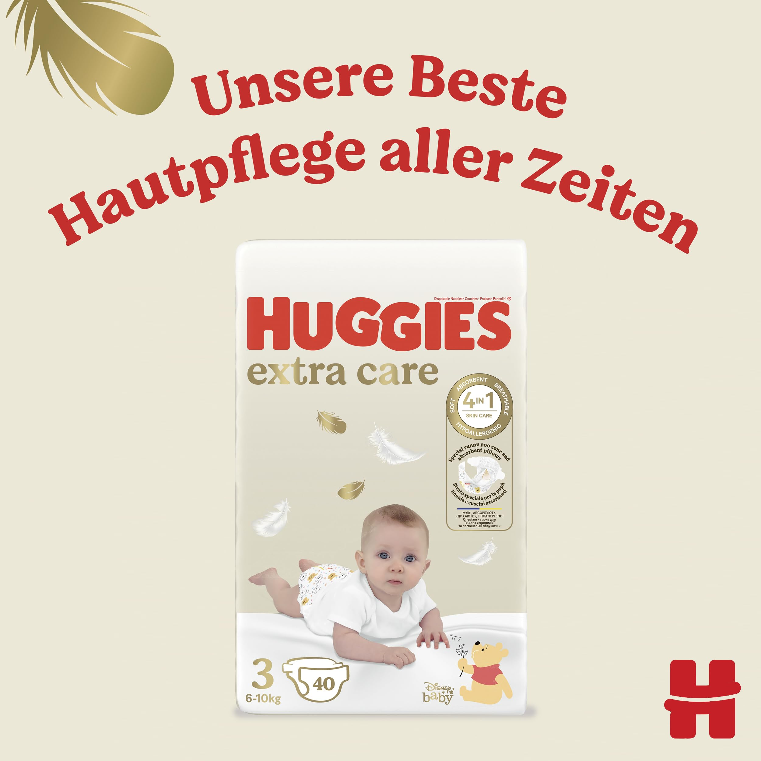 Huggies Extra Care Windelpackung mit einem Baby, Federn und deutscher Aufschrift.