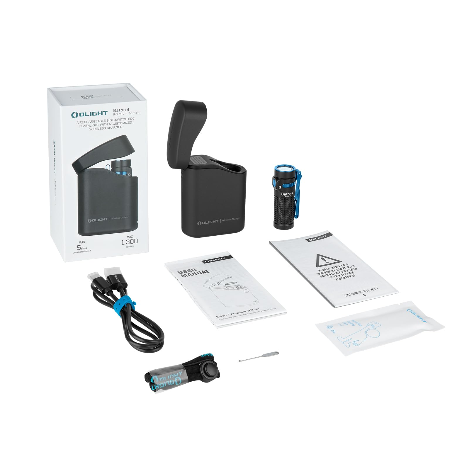 Olight Baton 4 Taschenlampe mit Ladecase, Kabel, Handbuch und Zubehör auf weißem Grund.
