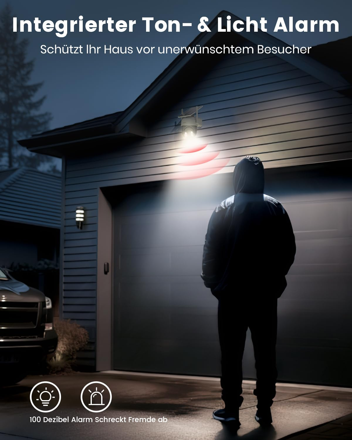 Una telecamera di sicurezza emette luce e onde rosse mentre un intruso si trova davanti a un garage.