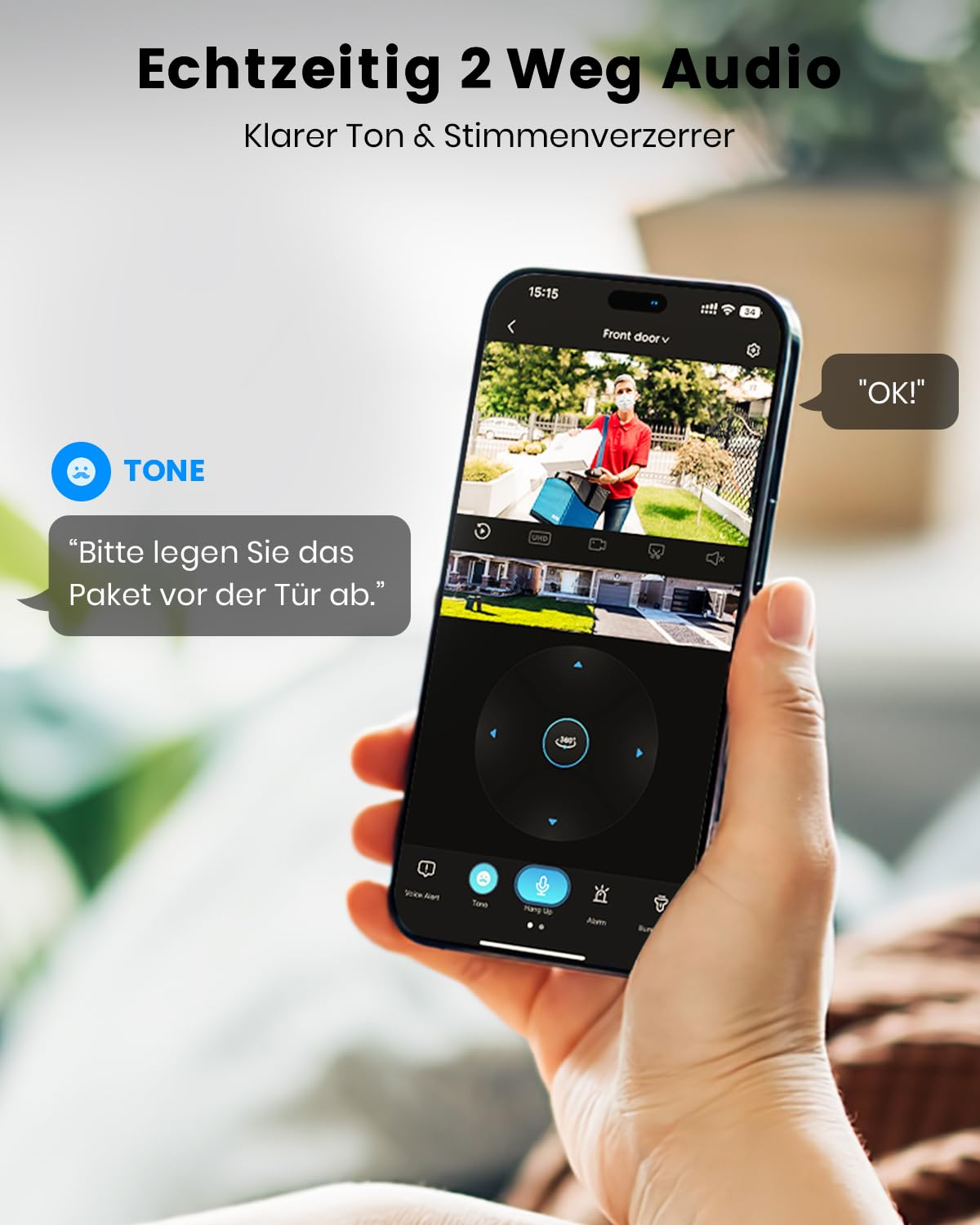 Mano tiene smartphone con app videocitofono e fumetti di testo.