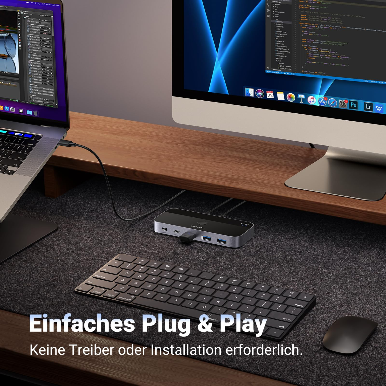 Una scrivania con laptop, monitor, tastiera, mouse e un hub USB.