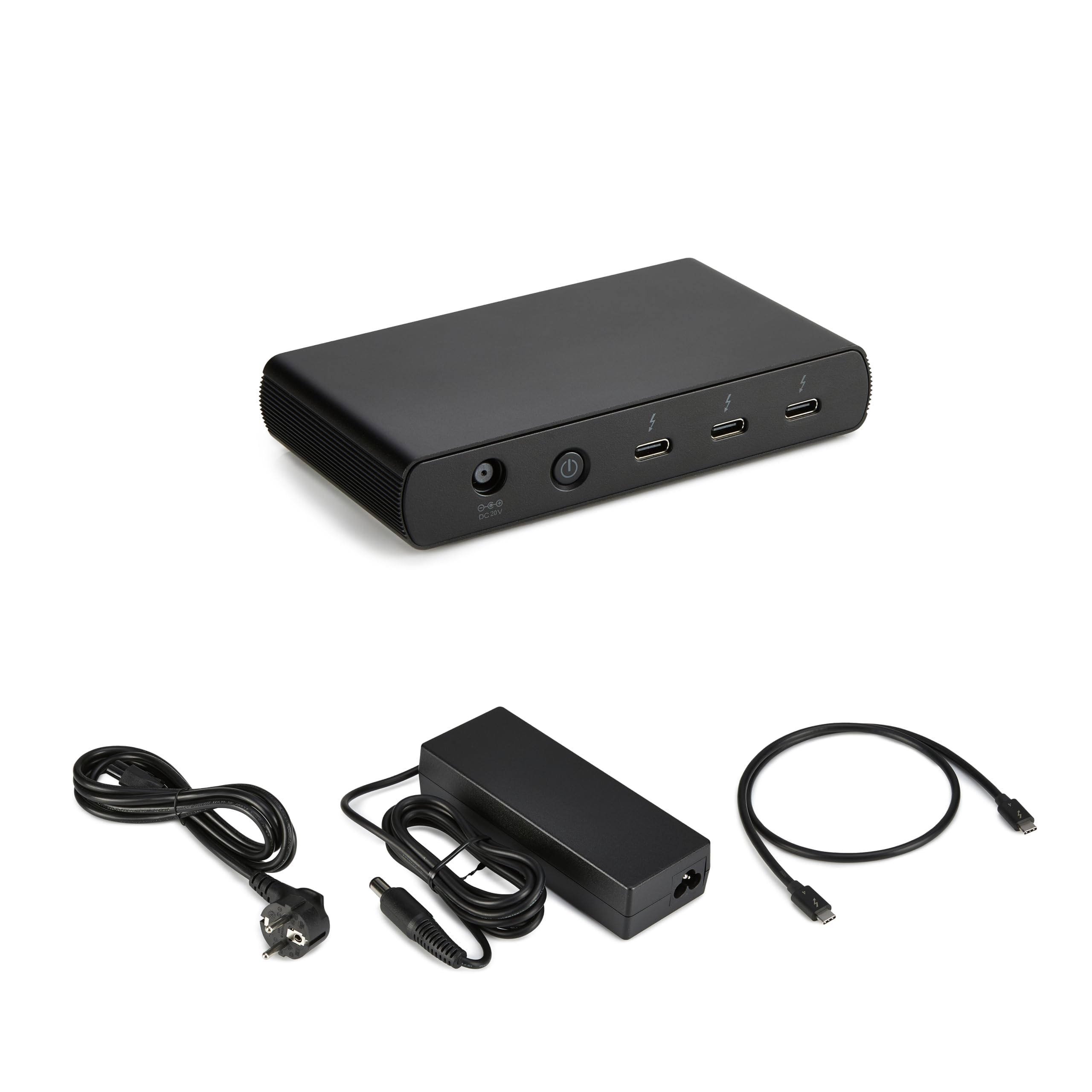 Una docking station nera con cavo di alimentazione, alimentatore e cavo USB-C su bianco.