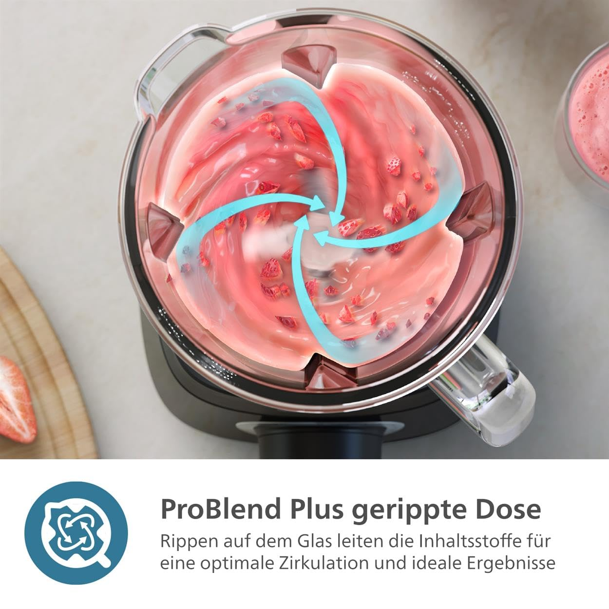 Frullatore dall'alto mostra un mix di frutta rosa con frecce blu che illustrano la circolazione.