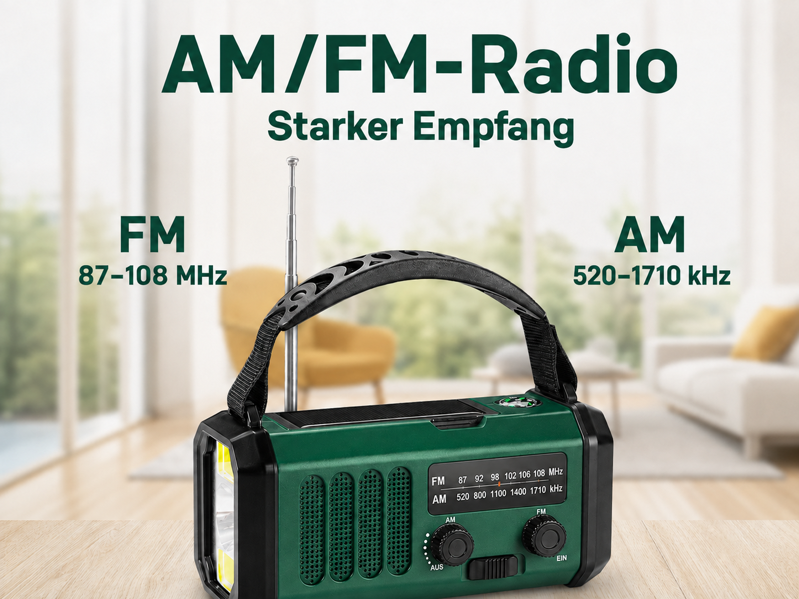 Ein grünes AM/FM-Notfallradio mit schwarzem Griff und Antenne auf einer Holzoberfläche in einem hellen Raum.