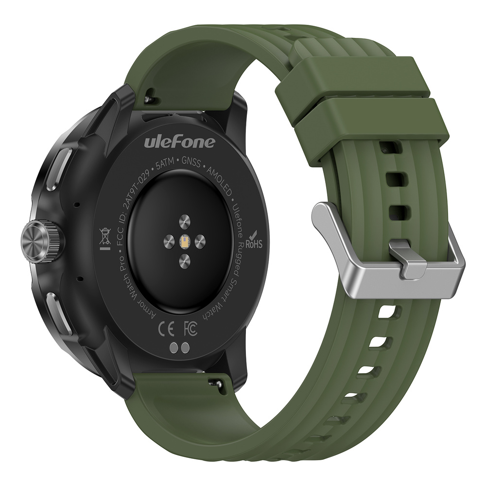 Vista trasera de un reloj inteligente negro con correa de silicona verde, hebilla plateada y sensores en la parte trasera.