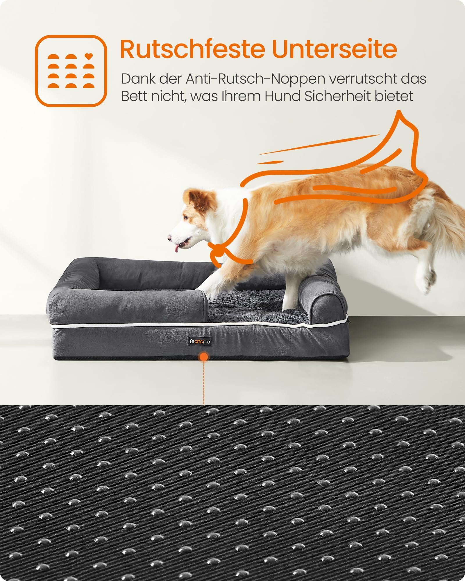 Un chien saute par-dessus un lit pour chien gris en peluche avec un fond antidérapant.