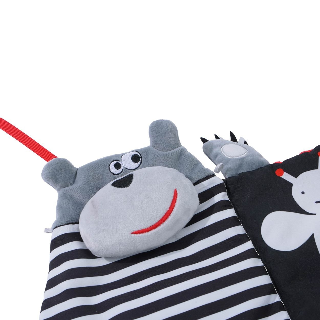 Ein Plüsch-Babybuch mit grauem Nilpferdkopf und schwarz-weiß gestreiftem Körper vor weißem Hintergrund.