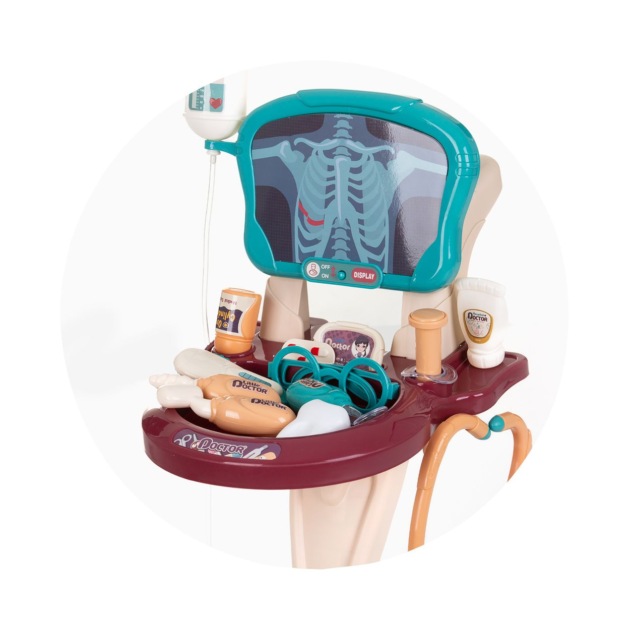 Ein Spielzeug-Arztkoffer mit Röntgenschirm, Stethoskop und verschiedenen medizinischen Plastikinstrumenten.