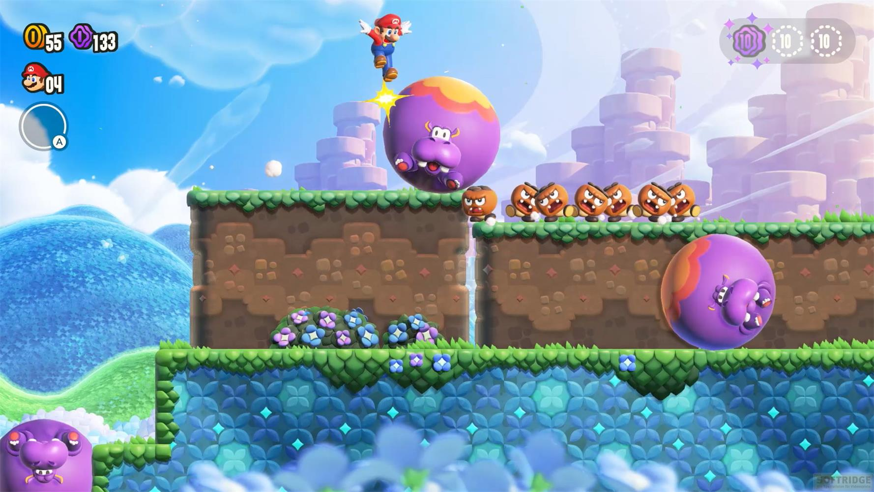 Mario springt auf eine große lila Kreatur, umgeben von Gegnern in einer farbenfrohen Spielwelt.