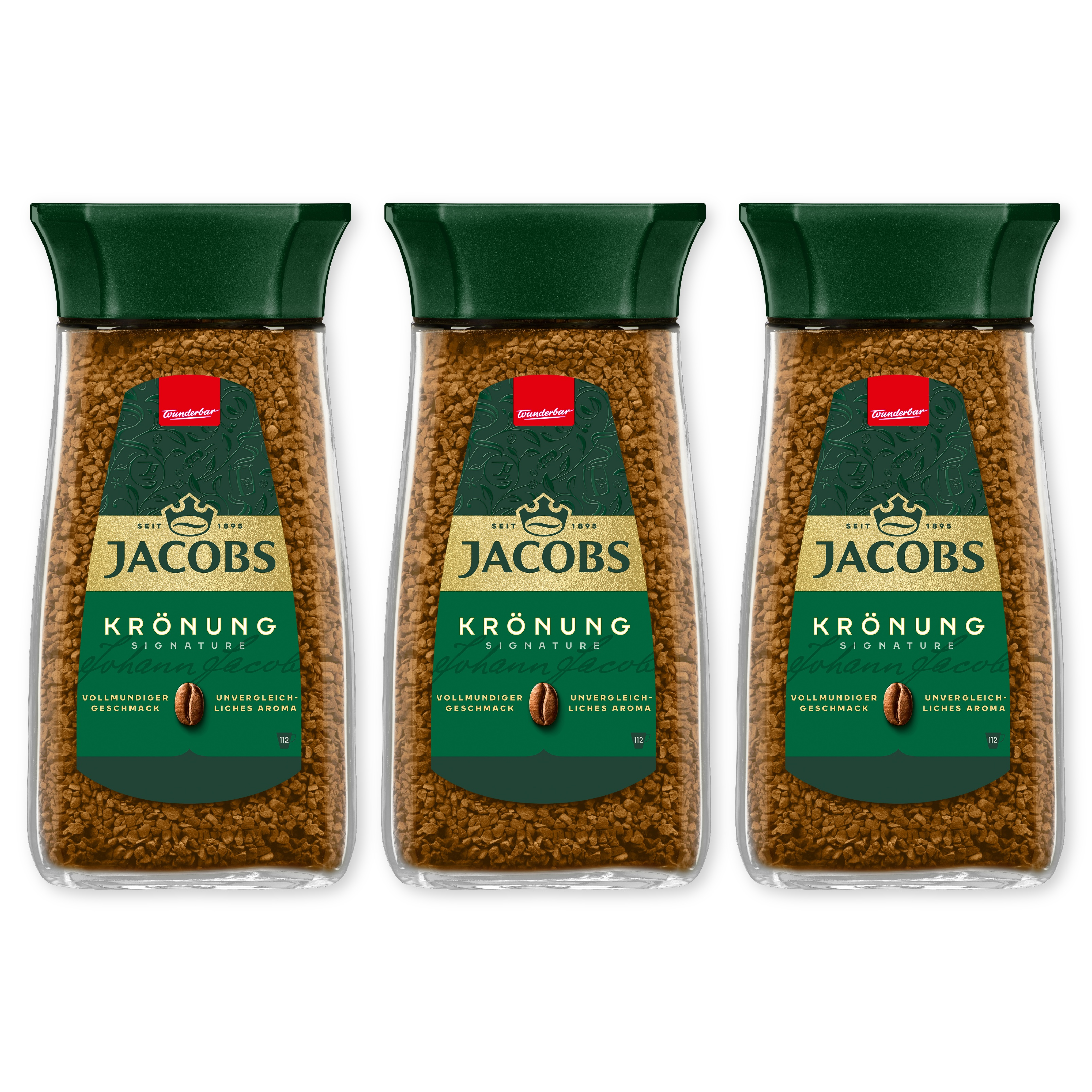 Drei Gläser Jacobs Krönung Instantkaffee mit dunkelgrünem Etikett und Deckel.