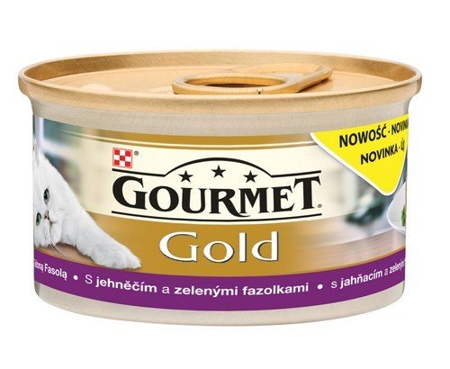 Złota puszka karmy dla kotów Gourmet Gold z białym kotem i napisem na fioletowym pasku.