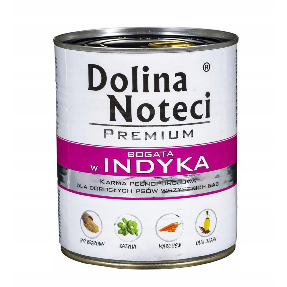 Metalowa puszka karma dla psa Dolina Noteci Premium z indykiem oraz ikonami brązowego ryżu, bazylii, marchewki i oleju lnianego.