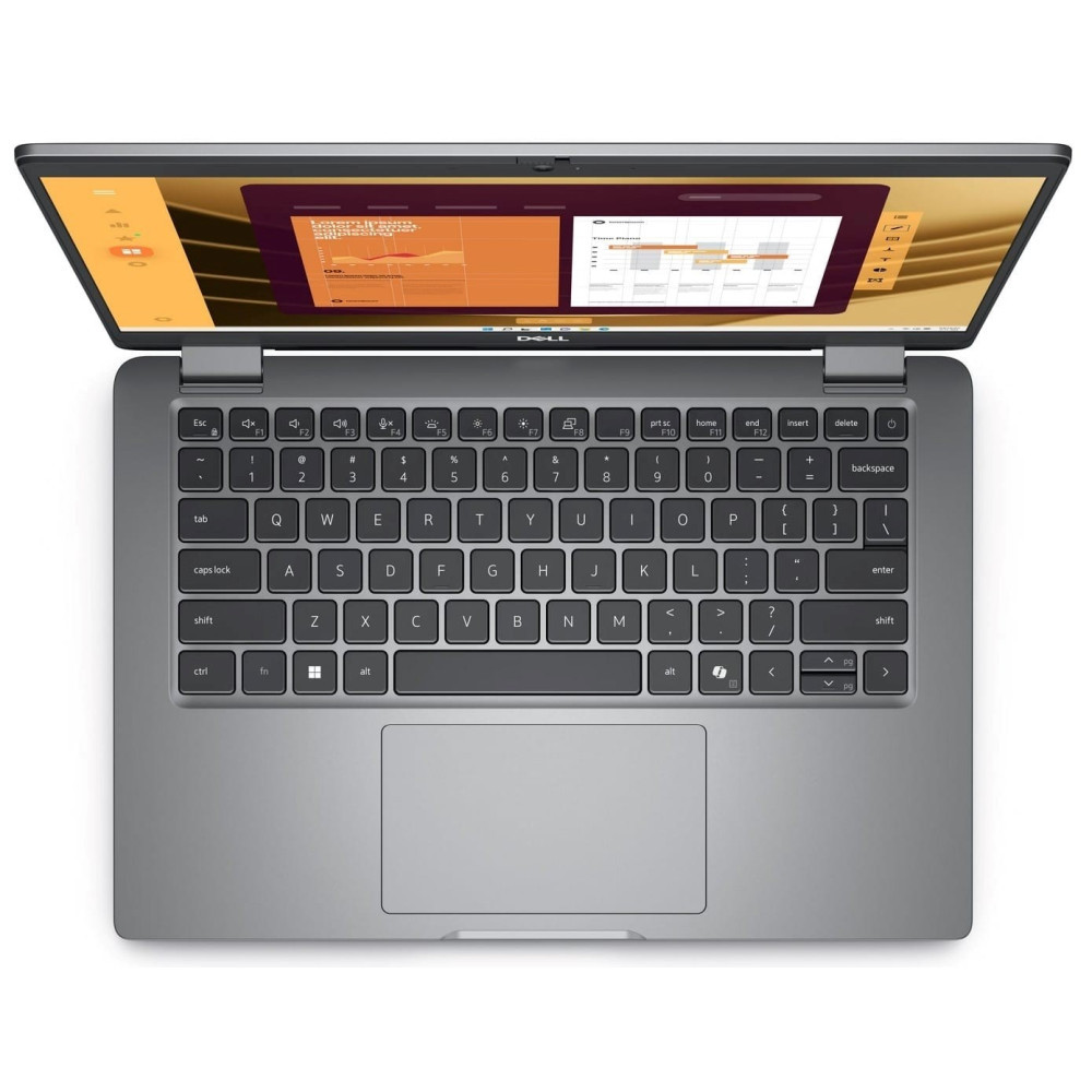 Widok z góry na szary laptop Dell z pomarańczowym interfejsem na ekranie, widoczna klawiatura i touchpad.