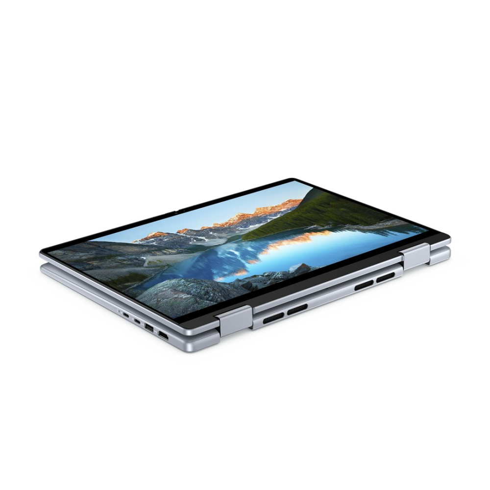 Srebrny laptop w trybie namiotu wyświetla na ekranie górski pejzaż.