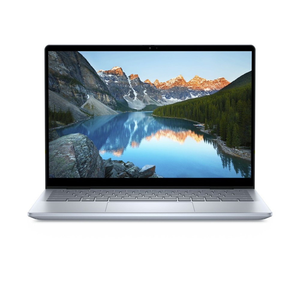 Srebrny laptop wyświetla na ekranie górski krajobraz z jeziorem i lasem.