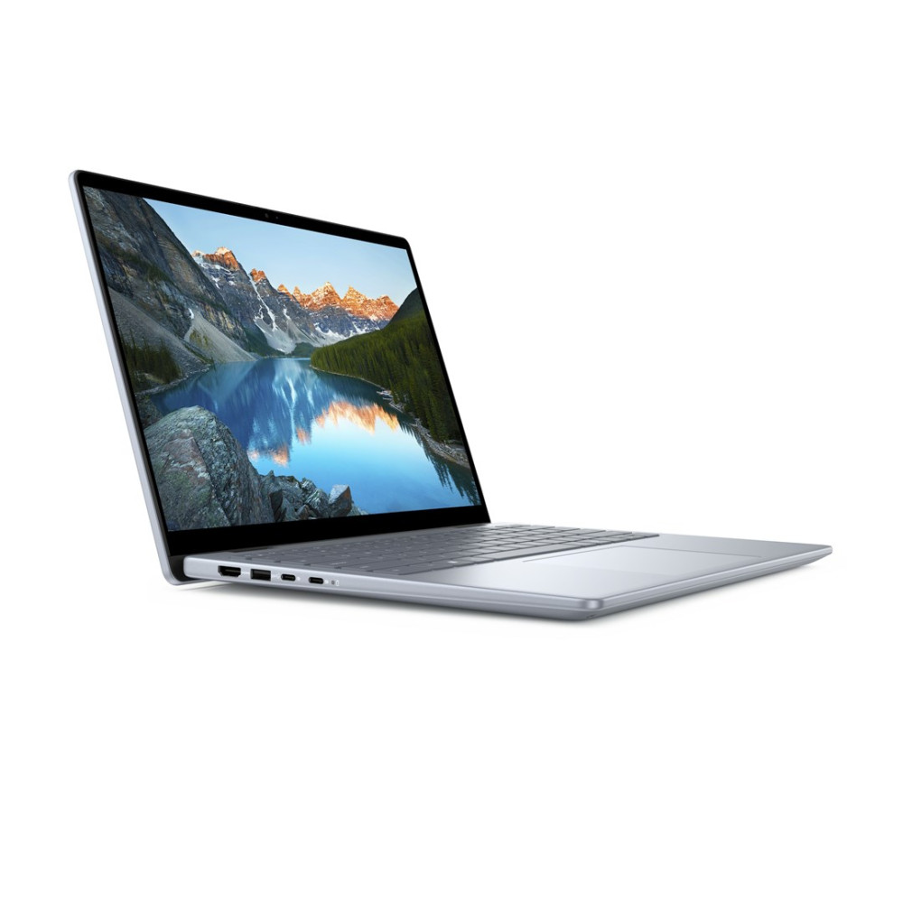 Srebrny laptop jest otwarty na białym tle, pokazując tapetę z górami i jeziorem.