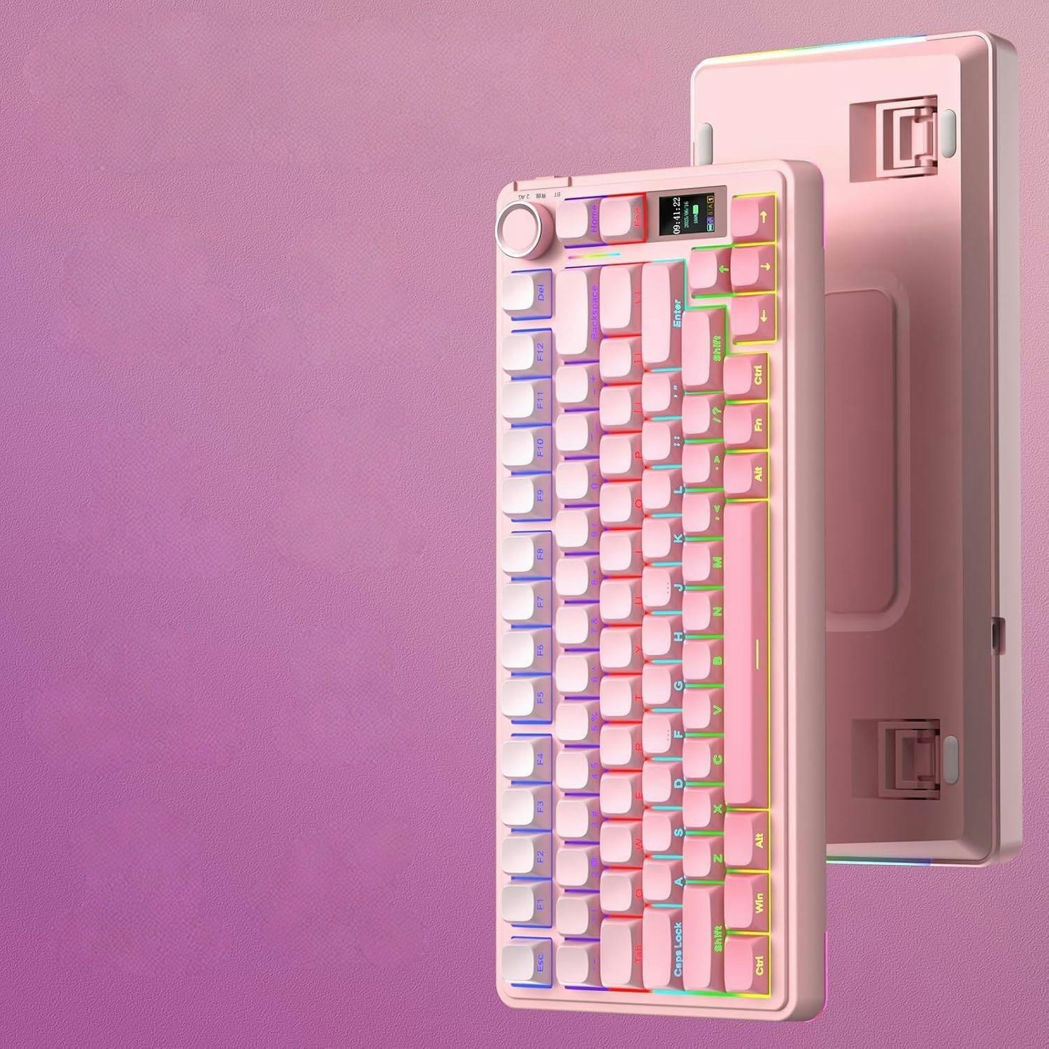 Różowa klawiatura mechaniczna z podświetleniem RGB i małym wyświetlaczem, na różowym tle.