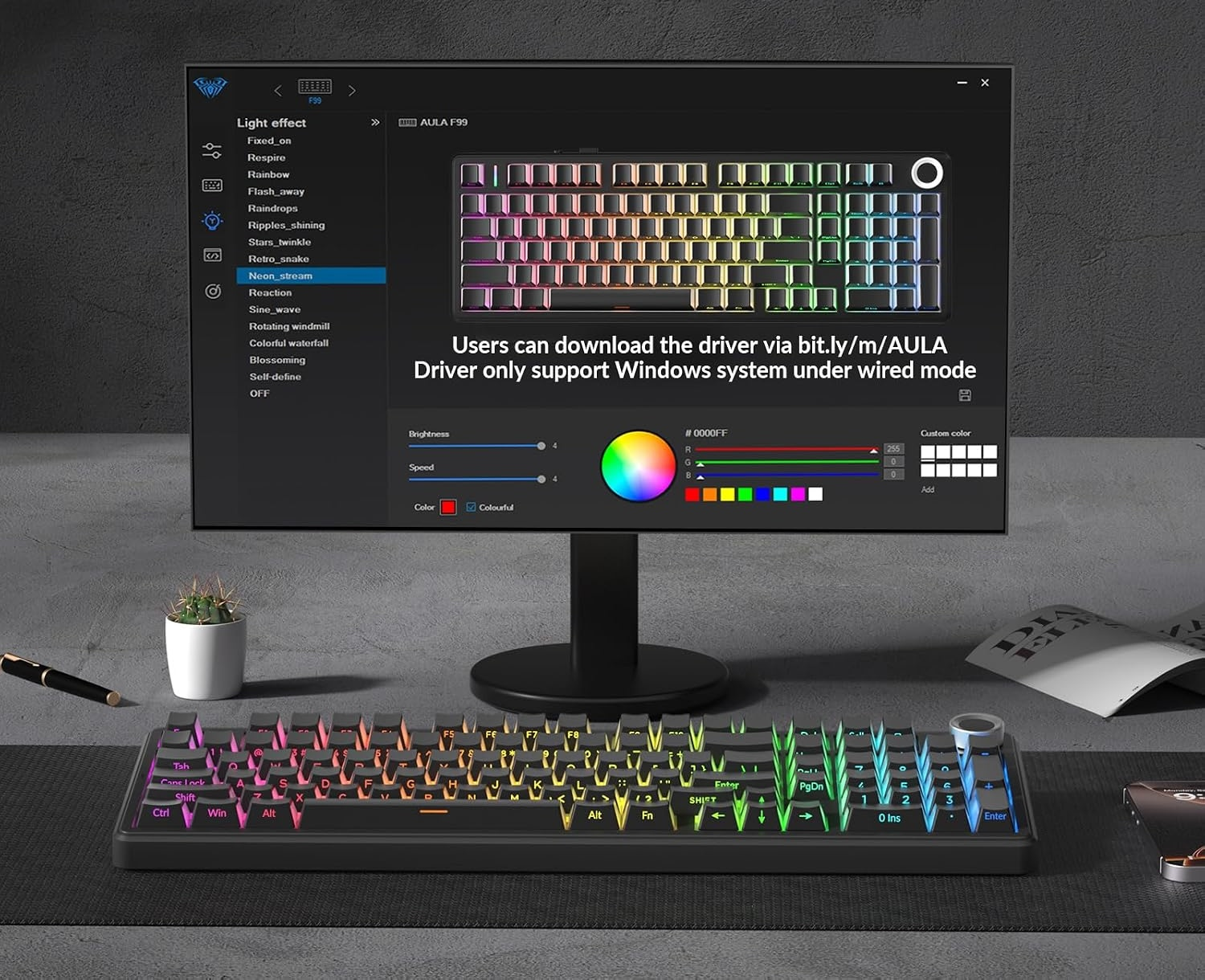 Podświetlana klawiatura RGB przed monitorem pokazującym oprogramowanie do sterowania efektami świetlnymi.