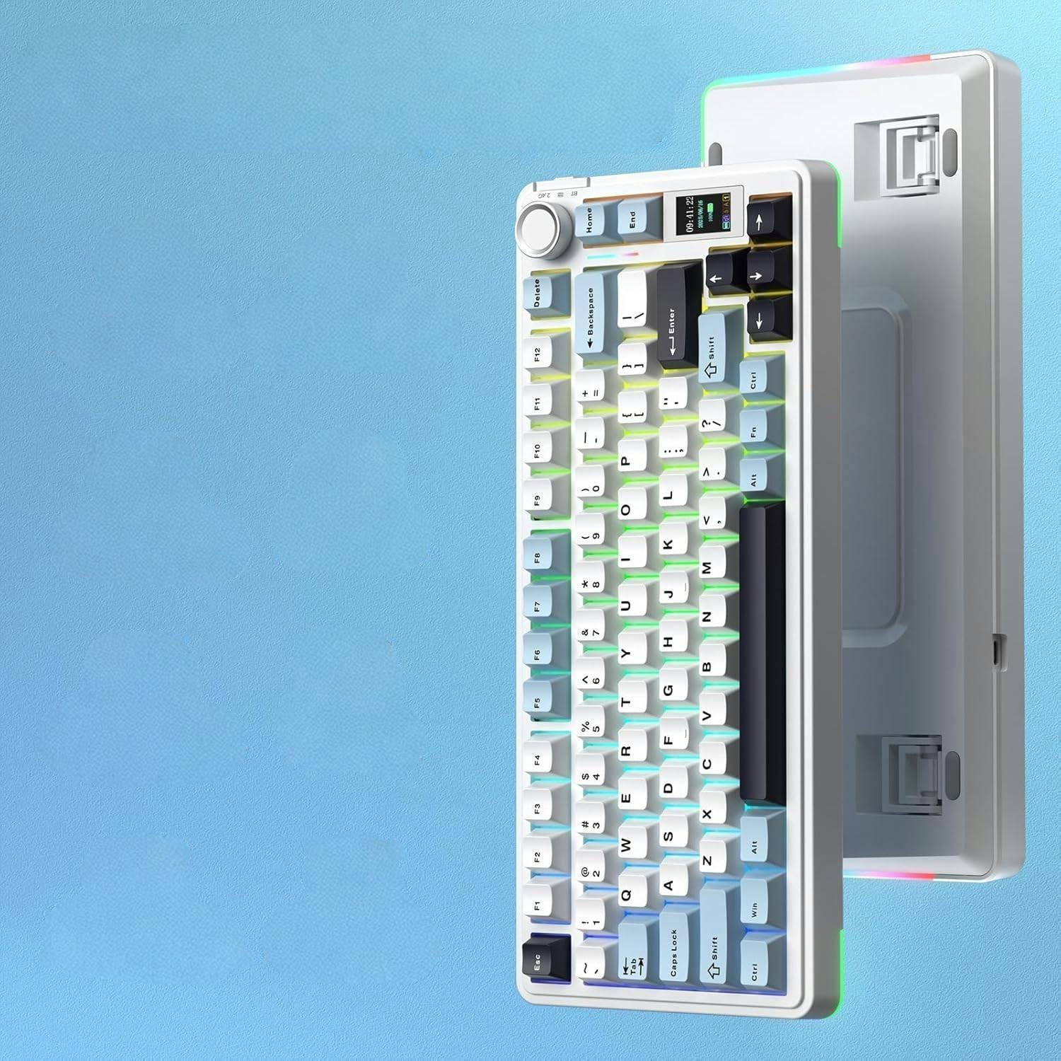 Biała mechaniczna klawiatura gamingowa z podświetleniem RGB, cyfrowym wyświetlaczem i pokrętłem głośności na niebieskim tle.