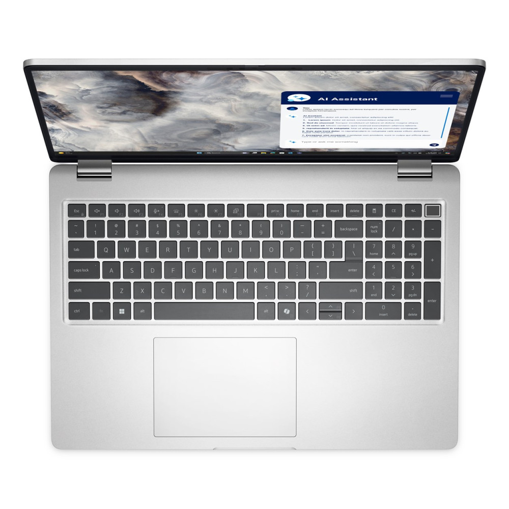 Srebrny laptop widziany od góry z otwartym ekranem i podświetlaną klawiaturą.