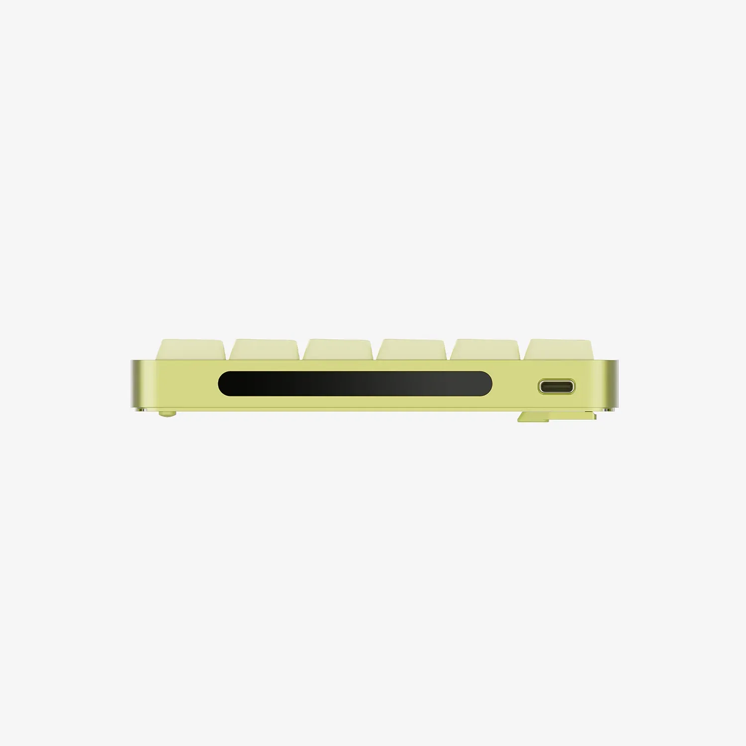 Widok z boku żółtej klawiatury z długim czarnym wyświetlaczem i portem USB-C na jasnym tle.