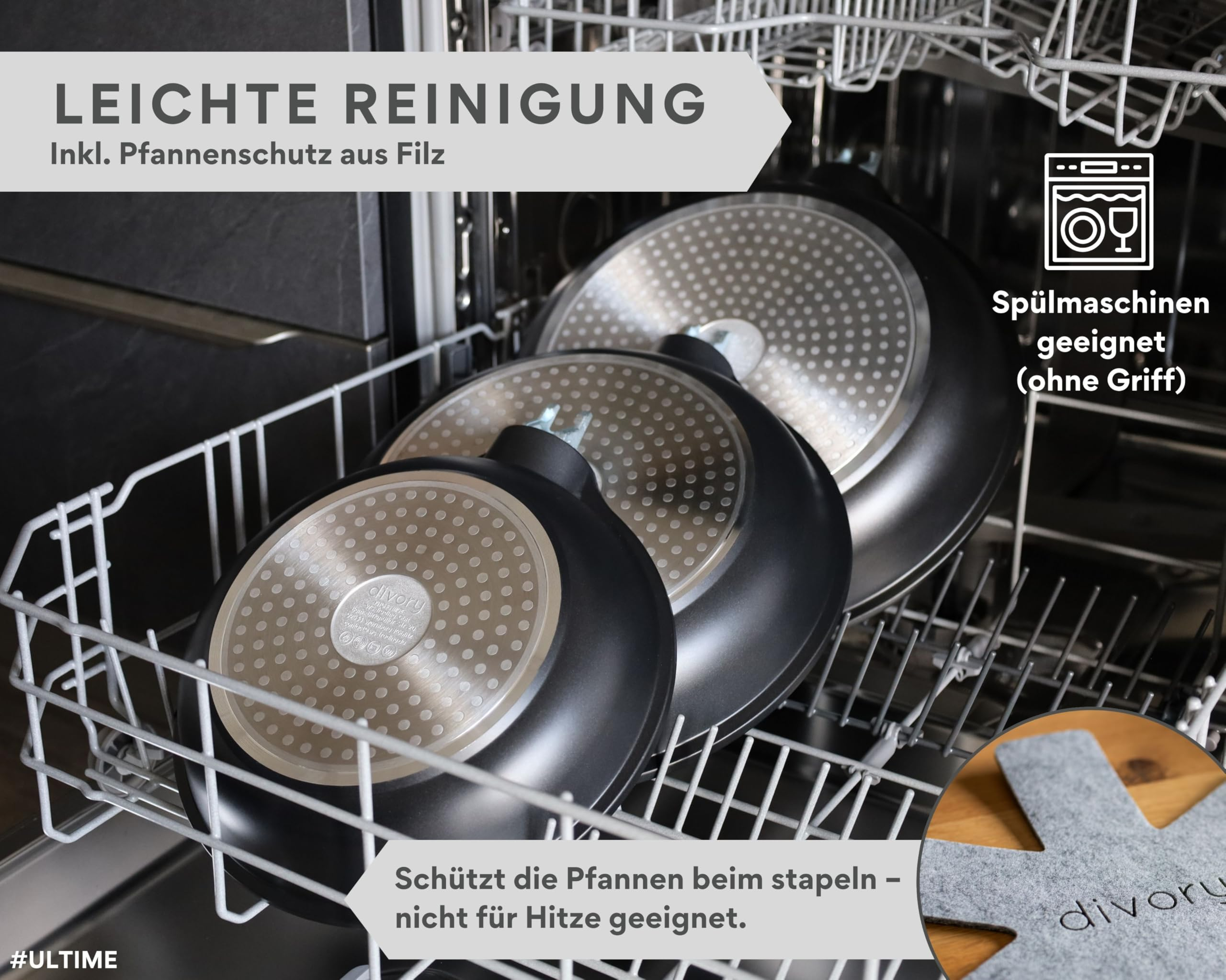 Drei schwarze Pfannen mit genopptem Boden stehen platzsparend in einer offenen Sp ülmaschine.