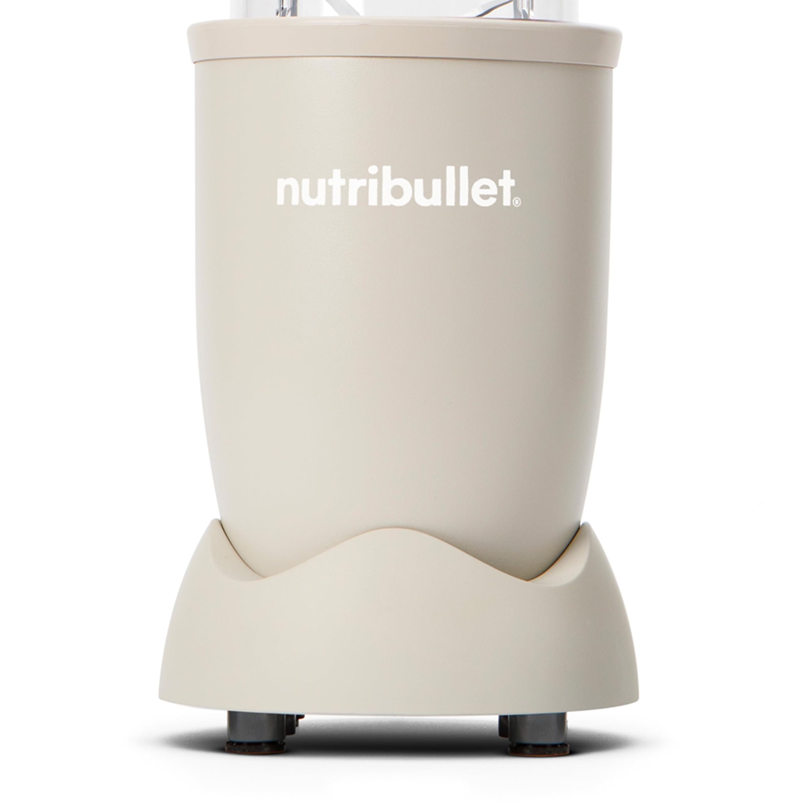 Beigefarbene Nutribullet-Blenderbasis auf kleinen Füßen vor weißem Hintergrund.