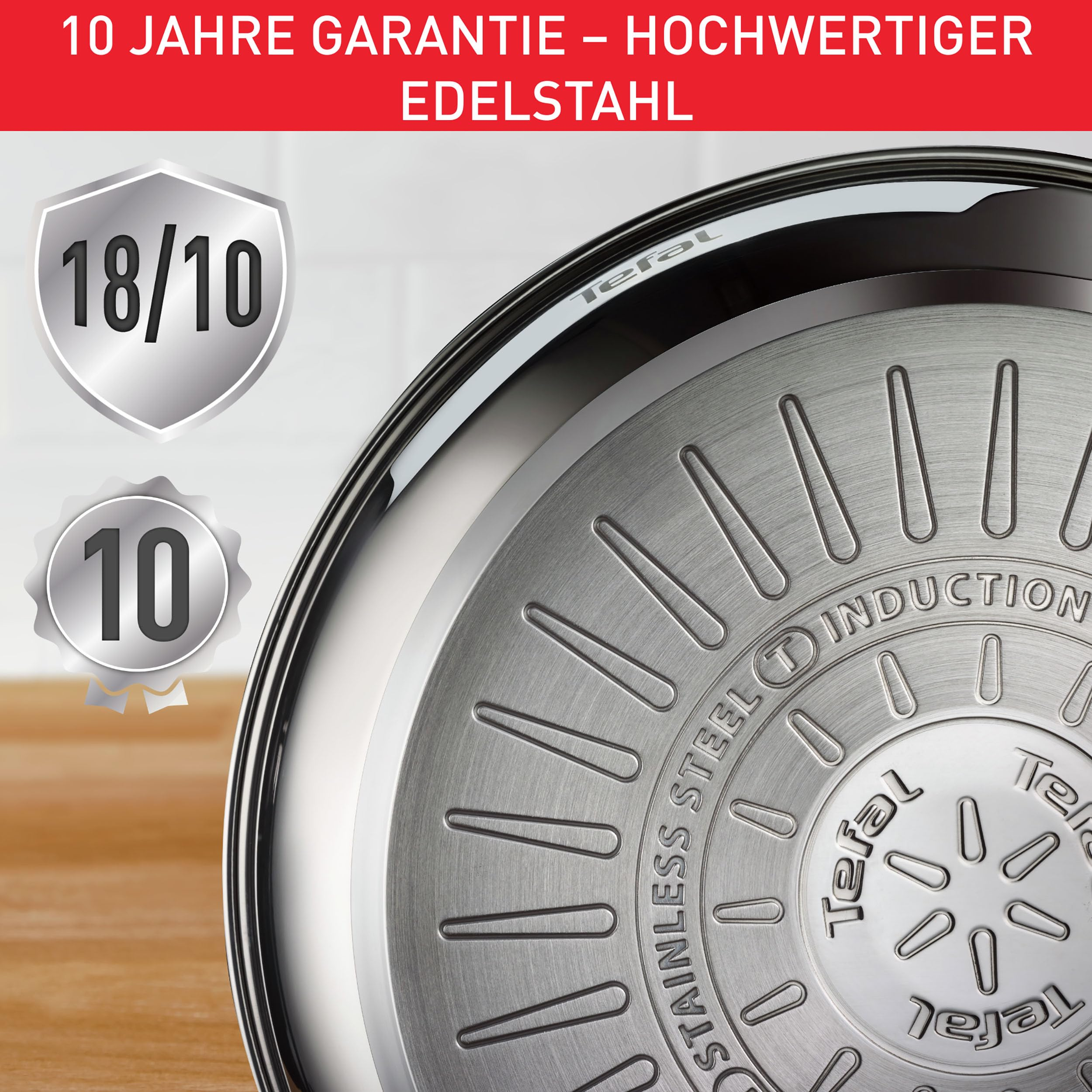 Fond de poêle en acier inoxydable avec logo Tefal, symbole induction et garantie.