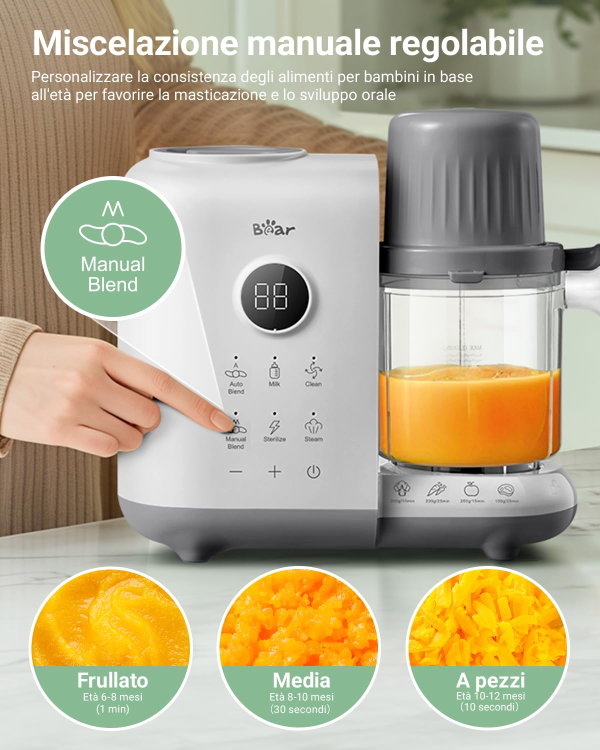 Ein weißer Baby-Nahrungszubereiter mit digitalem Display und orangem Püree im Glasbehälter auf einer Küchentheke.