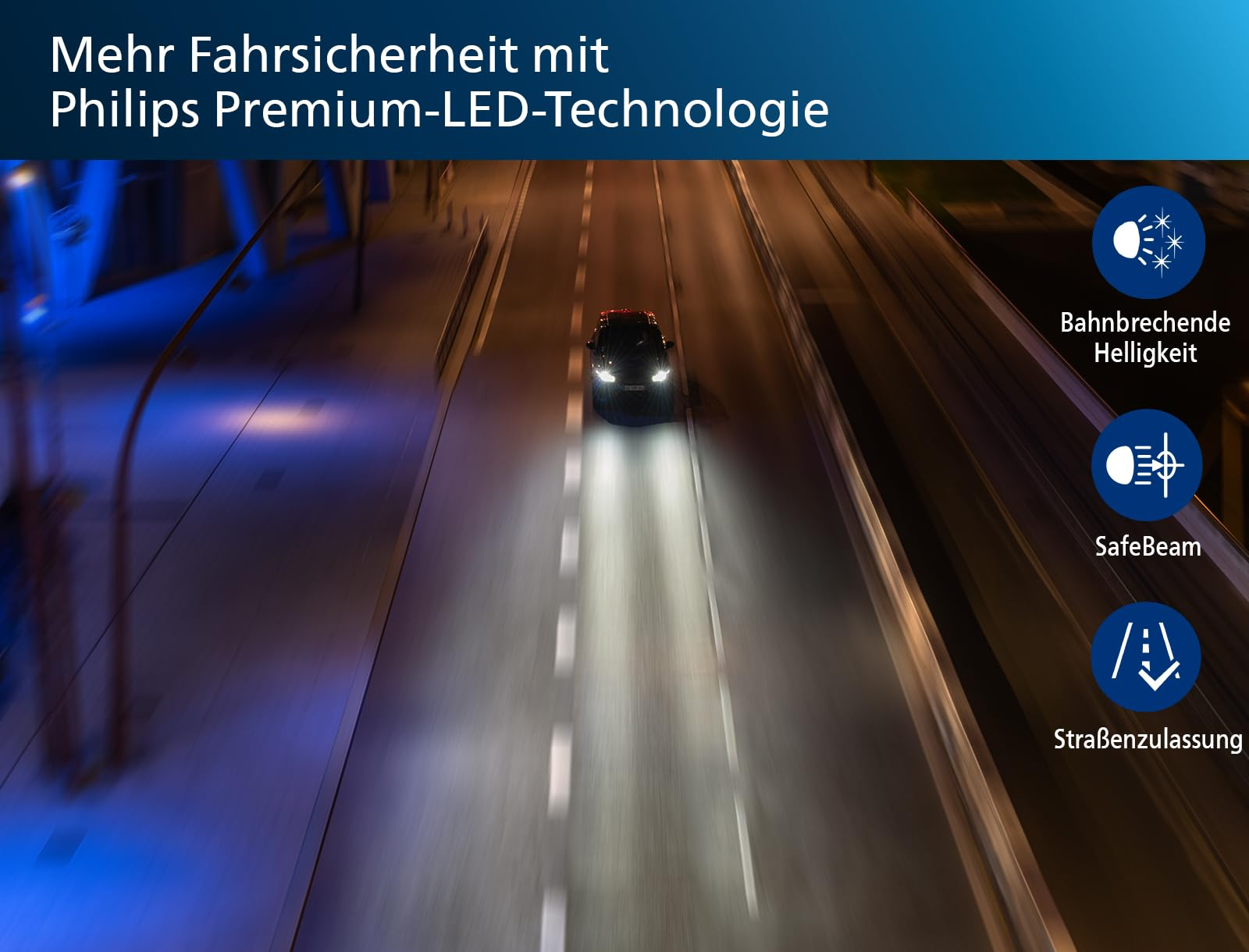 Une voiture roule de nuit sur une route éclairée avec des phares LED Philips lumineux.