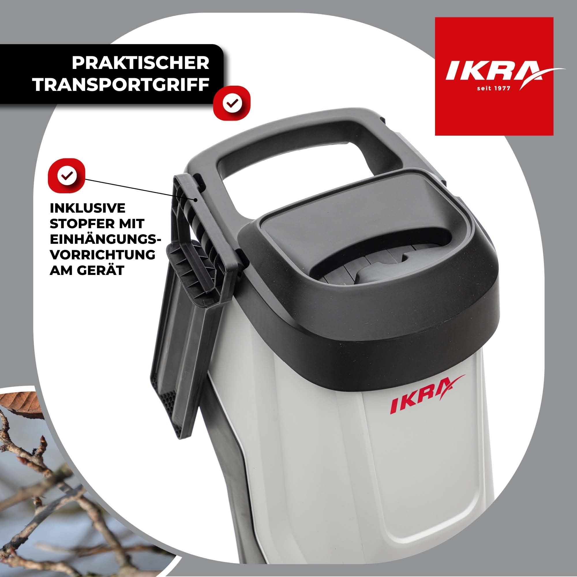 Grauer IKRA Gartenhacker mit integriertem Transportgriff und Stopfer.