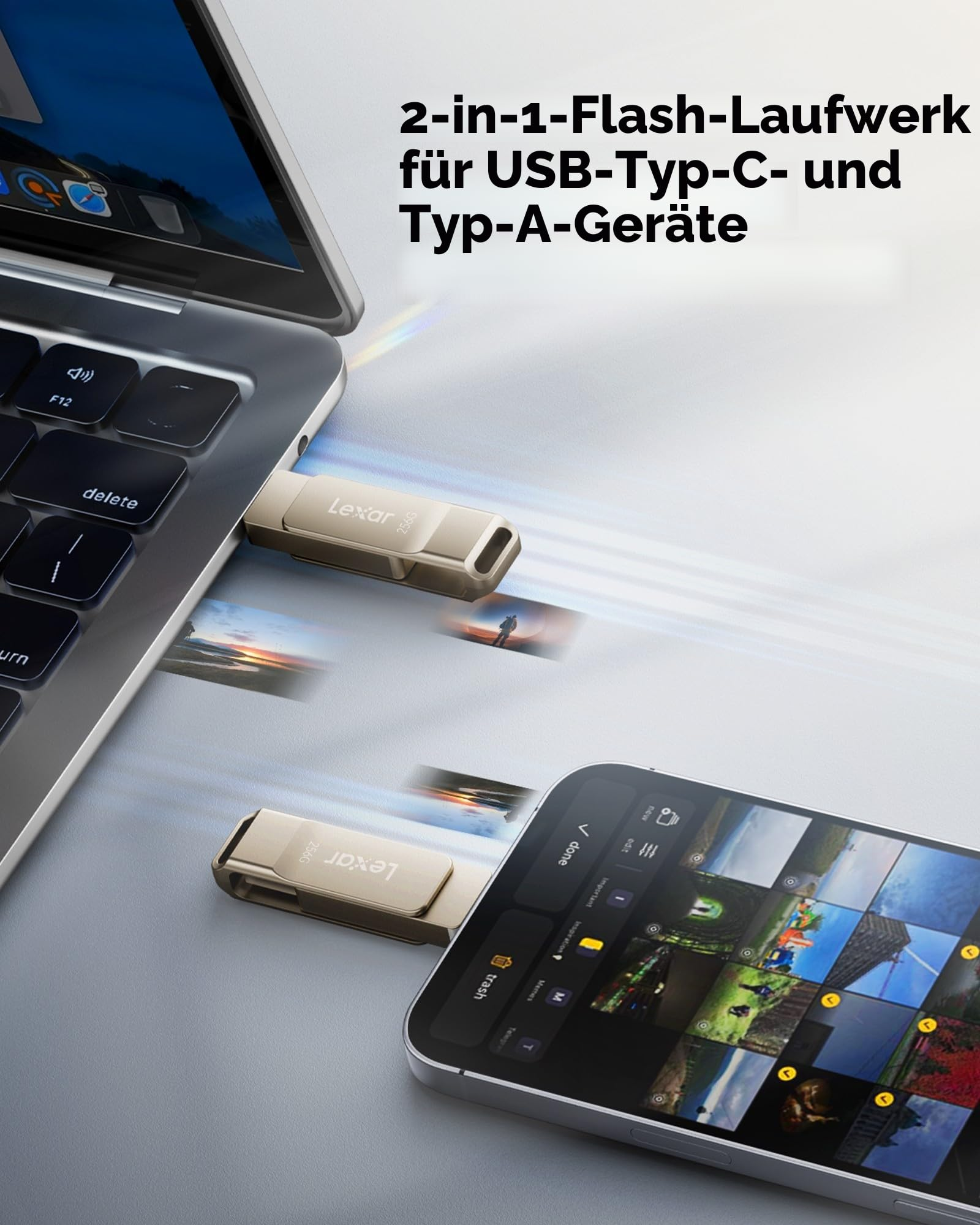Chiavetta USB color oro collegata a un computer portatile e a uno smartphone.