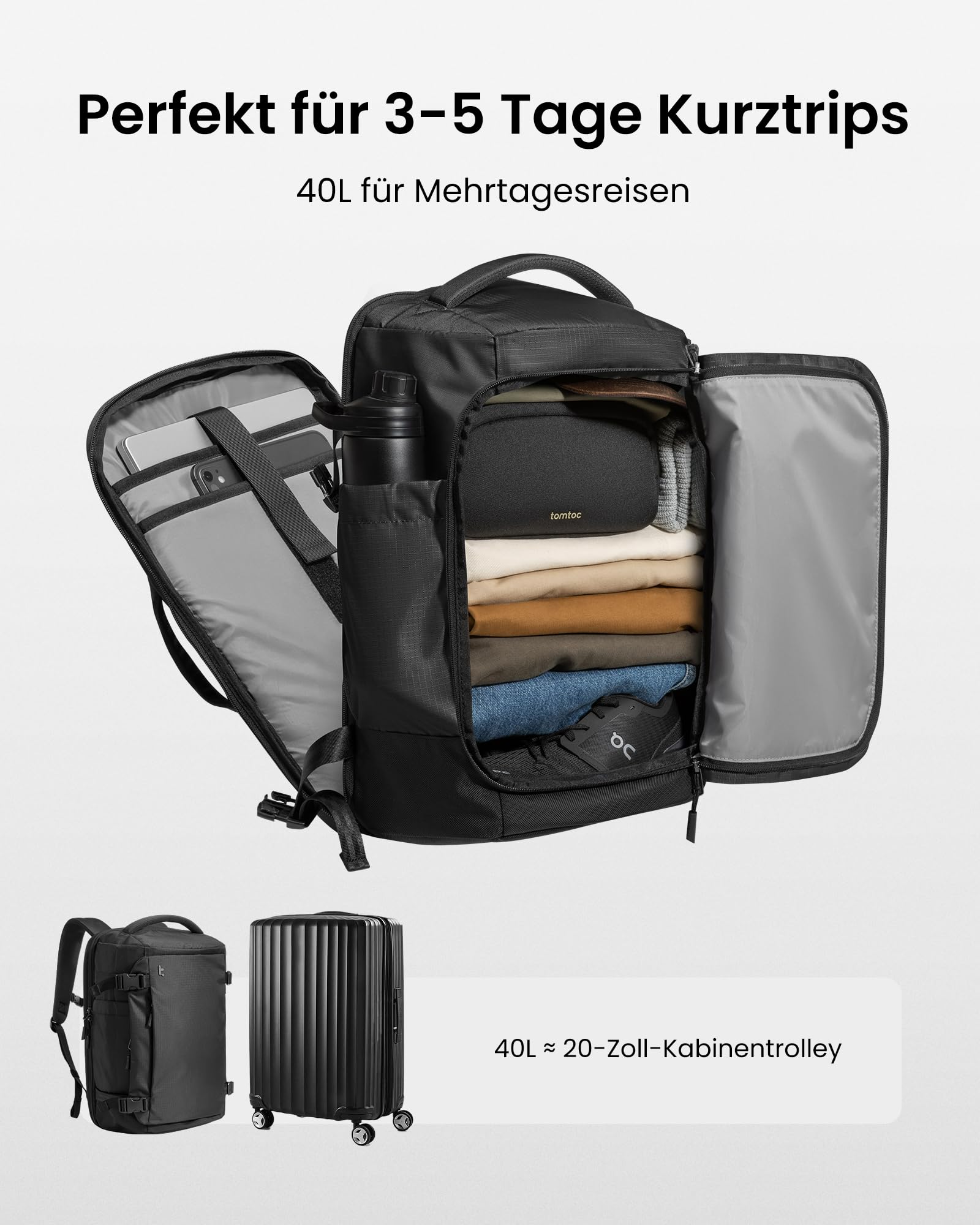 Ein offener schwarzer 40L Reiserucksack mit ordentlich gefalteter Kleidung, Kulturbeutel und Laptopfach.