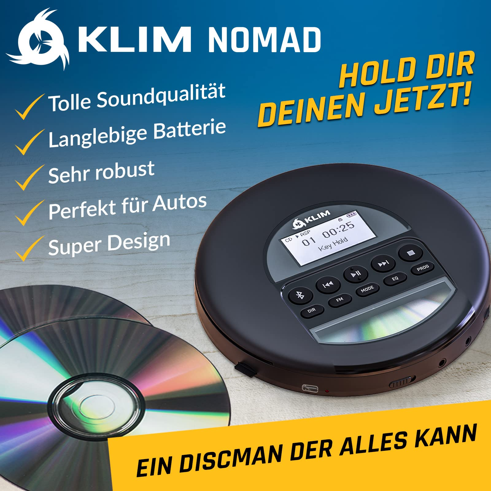 Ein schwarzer Klim Nomad Discman liegt neben zwei CDs auf einer Holzoberfläche, mit Text über seine Features.