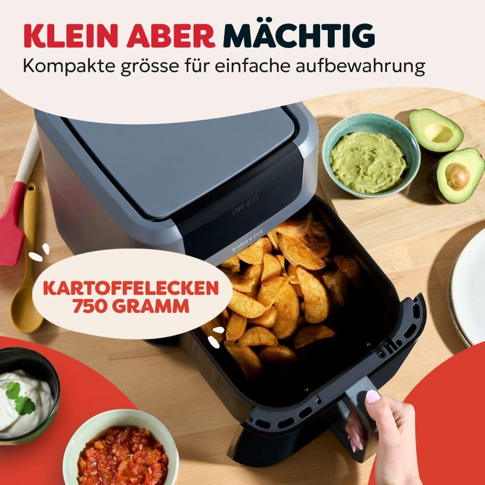 Friggitrice ad aria grigia con spicchi di patate e salse.